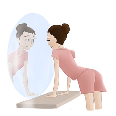 Woman in front of the mirror